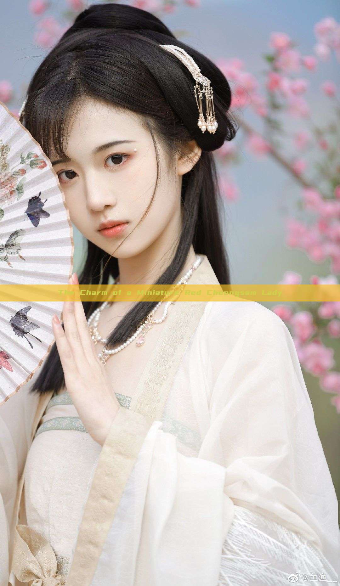 The Charm of a Miniature Red Cheongsam Lady The Charm of a Miniature Red Cheongsam Lady