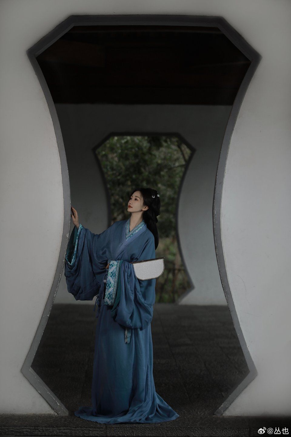 The Elegance of a Long Cheongsam Woman The Elegance of a Long Cheongsam Woman