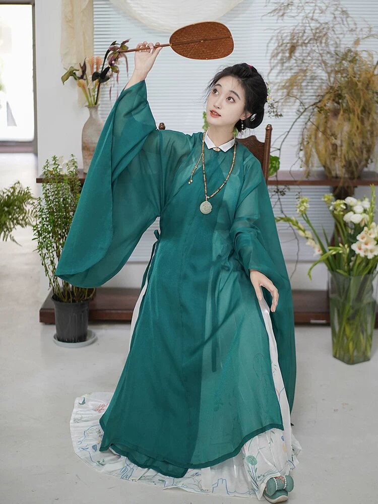 Embracing Modernity in a Reimagined Cheongsam:The Evolution of a Classic Womens Ensemble Embracing Modernity in a Reimagined Cheongsam:The Evolution of a Classic Womens Ensemble