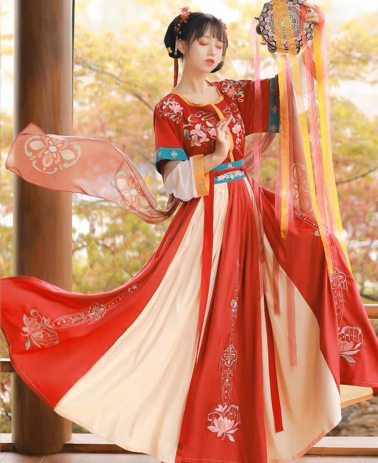 The Enchantment of a Red Cheongsam Woman during Winter Holiday at Year-End The Enchantment of a Red Cheongsam Woman during Winter Holiday at Year-End